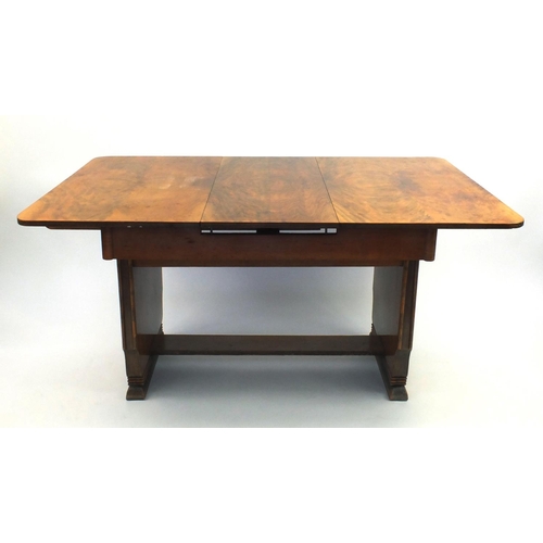 2016 - Art Deco Beautility walnut dining suite comprising a rectangular draw leaf dining table, four matchi... 