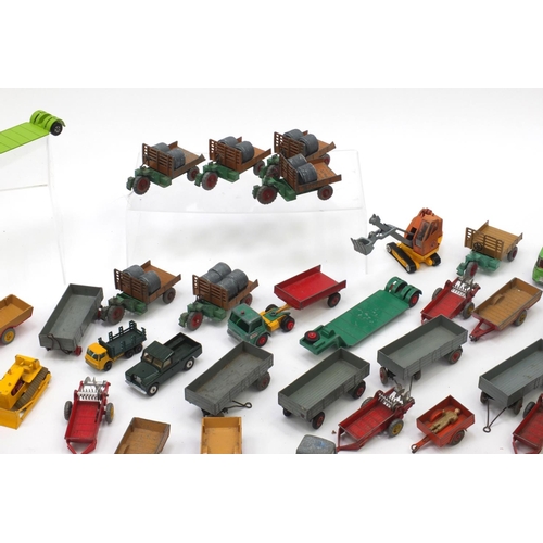 404 - Predominantly Corgi, Matchbox and Dinky agricultural vehicles and farm yard accessories including tr... 