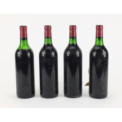 81 - Four bottles of Château Le Breuil red wine