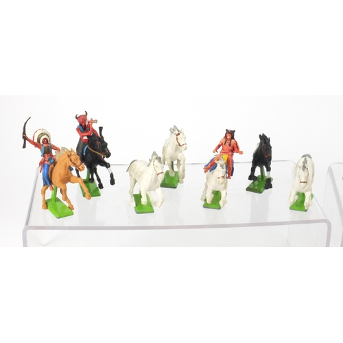 386 - Britain's plastic cowboys, Indians, horses and accessories, some with bases