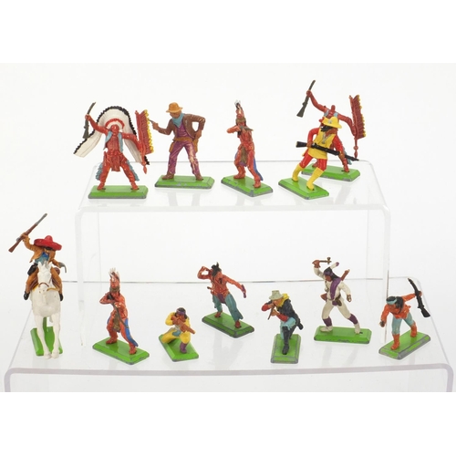 386 - Britain's plastic cowboys, Indians, horses and accessories, some with bases