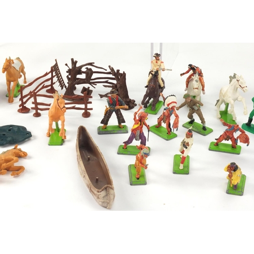 386 - Britain's plastic cowboys, Indians, horses and accessories, some with bases