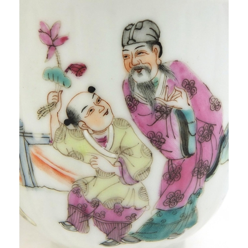 478 - Pair of Chinese porcelain tea cups, hand painted in the famille rose palette with court figures play... 