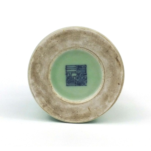 519 - Chinese celadon glazed cylindrical brush pot, decorated in low relief with a continuous band of clou... 