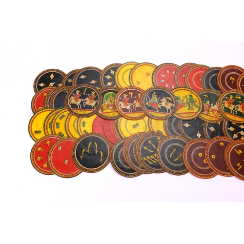 640 - Middle Eastern circular counters each hand painted with various symbols, each 9cm in diameter