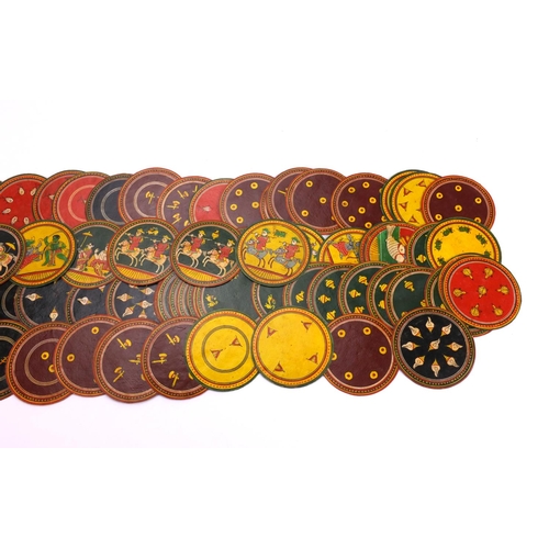 640 - Middle Eastern circular counters each hand painted with various symbols, each 9cm in diameter