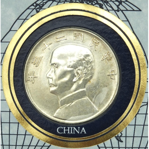 216 - Chinese Yuan silver dollar coin cover, from The Great Historic silver coins of the World by Internat... 