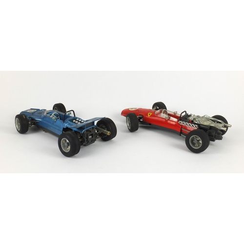 397 - Two Schuco clockwork racing cars comprising Ferrari 320PS and Matra-Ford 430PS examples, the largest... 