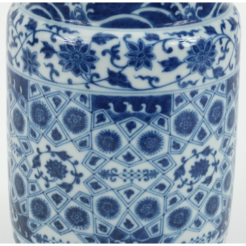 492 - Chinese blue and white porcelain cylindrical vase, hand painted with flowers, 23cm high