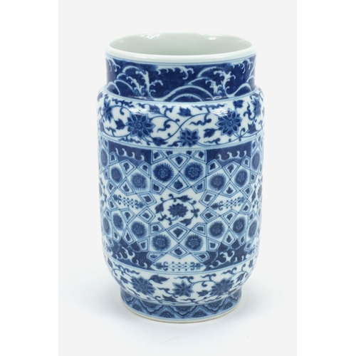 492 - Chinese blue and white porcelain cylindrical vase, hand painted with flowers, 23cm high