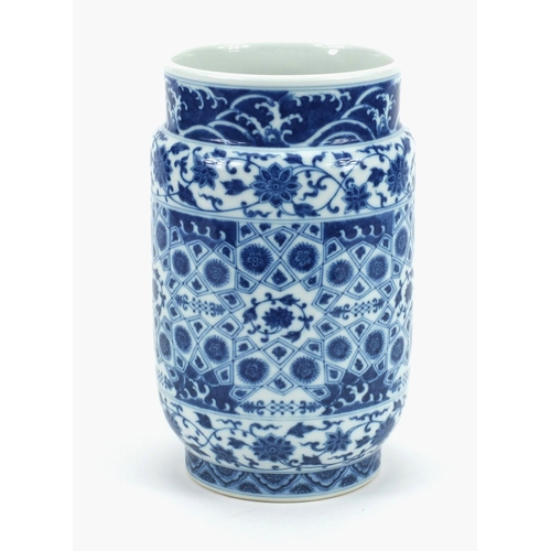 492 - Chinese blue and white porcelain cylindrical vase, hand painted with flowers, 23cm high