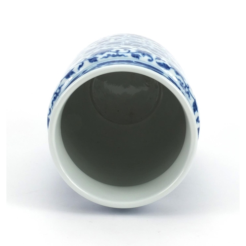 492 - Chinese blue and white porcelain cylindrical vase, hand painted with flowers, 23cm high