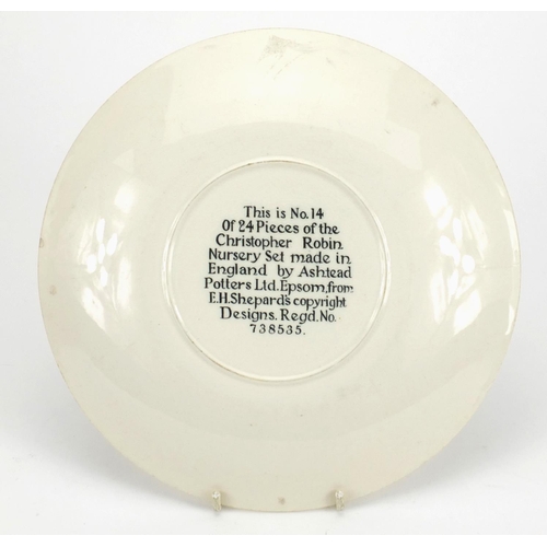 749 - Ashtead pottery nursery plate 'I do like a little bit of butter to my bread', factory marks and Regd... 