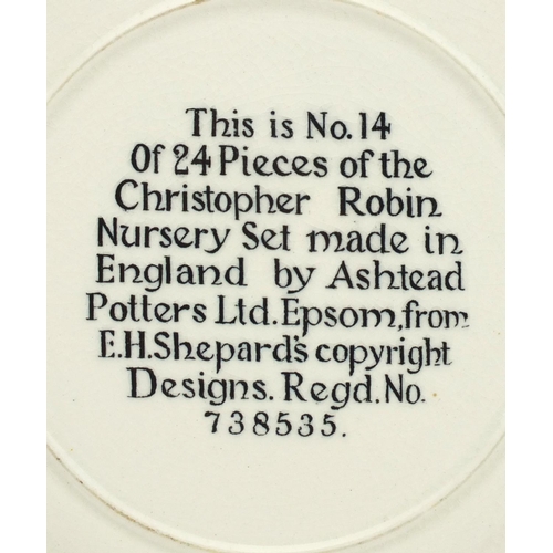 749 - Ashtead pottery nursery plate 'I do like a little bit of butter to my bread', factory marks and Regd... 