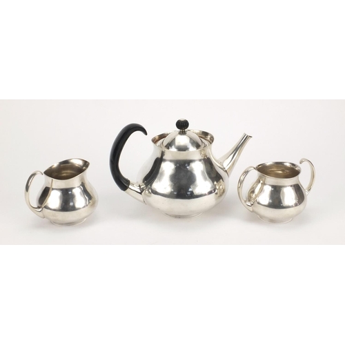 785 - Elkington silver plated three piece tea service designed by Eric Clements, each with factory marks a... 