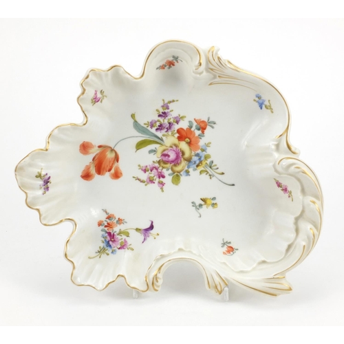 666 - Continental porcelain leaf shaped dish hand painted with flowers, factory marks to the base, 27cm wi... 