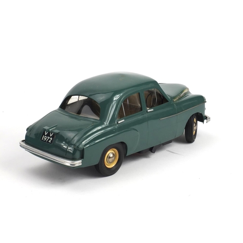 396 - Three Mechanical/Electric model cars all boxed, comprising Tri-ang series MGA, Vauxhall Velox models... 