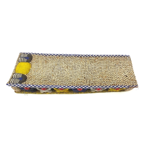 633 - 19th century Tribal interest Bamileke Cowrie shell and beadwork bed, 168cm in length