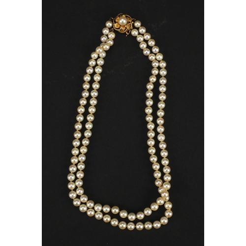 939 - Two string cultured pearl necklace with 14ct gold clasp, 38cm long, approximate weight 44.6g