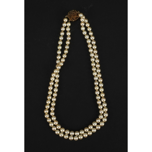 939 - Two string cultured pearl necklace with 14ct gold clasp, 38cm long, approximate weight 44.6g