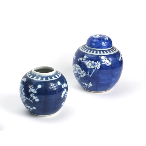 506 - Seven Chinese blue and white porcelain ginger jars and covers, each hand painted with Prunus flowers... 