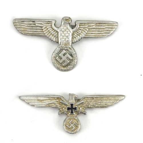 291 - Four German Military interest cap badges