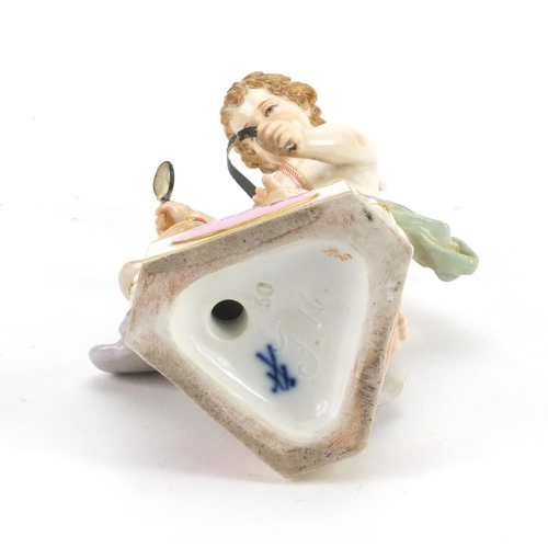 652 - 19th century Meissen porcelain model of a winged cupid on a triangular base, 'Je Le Dompte' , blue c... 