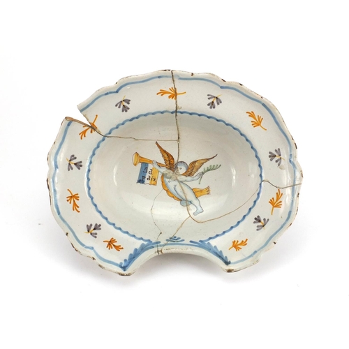 672 - Antique continental maiolica pottery barbers bowl hand painted with a winged figure, 31cm wide