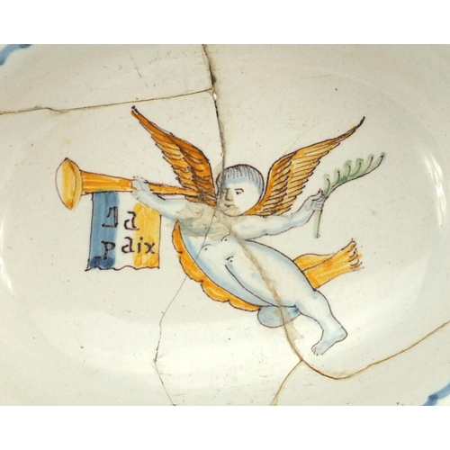 672 - Antique continental maiolica pottery barbers bowl hand painted with a winged figure, 31cm wide