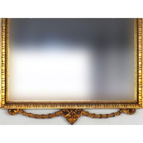 2022 - Rectangular gilt framed bevel edged mirror, decorated with urns, figures and swags, 114cm x 62.5cm