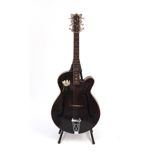 2853 - 1970/80's Korean made wooden acoustic guitar, with Mother of Pearl inlay and hand painted with a ros... 