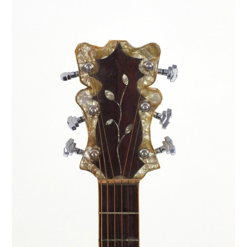 2853 - 1970/80's Korean made wooden acoustic guitar, with Mother of Pearl inlay and hand painted with a ros... 