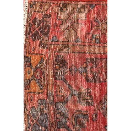 2067 - Rectangular Persian Hamadan rug, the central field and borders having all over floral motifs onto a ... 