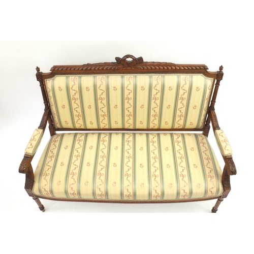 2003 - Victorian carved walnut two-seater settee with striped upholstery 102cm high x 131cm wide x 53cm dee... 