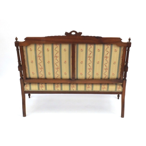 2003 - Victorian carved walnut two-seater settee with striped upholstery 102cm high x 131cm wide x 53cm dee... 