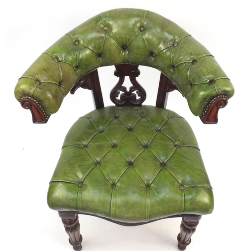 2018 - William IV mahogany elbow library chair, upholstered in green hide on turned fluted legs, originally... 