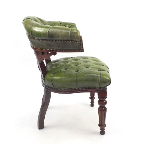 2018 - William IV mahogany elbow library chair, upholstered in green hide on turned fluted legs, originally... 