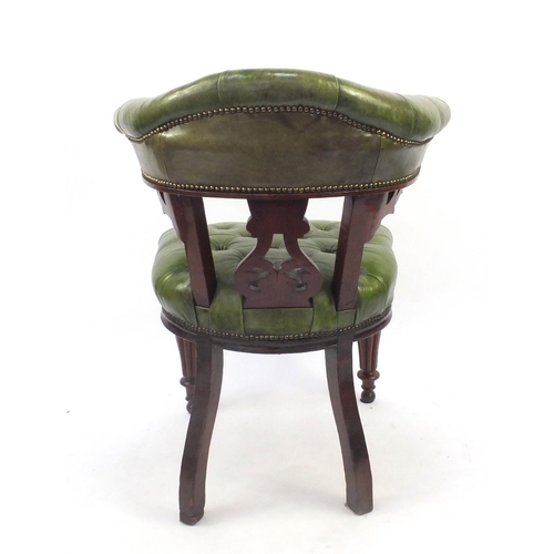 2018 - William IV mahogany elbow library chair, upholstered in green hide on turned fluted legs, originally... 