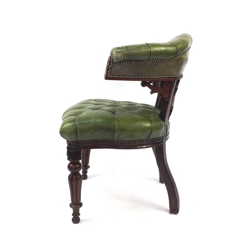 2018 - William IV mahogany elbow library chair, upholstered in green hide on turned fluted legs, originally... 