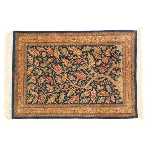 2005 - Very fine rectangular Persian Qum silk rug, the central field with tree of life design, within flora... 