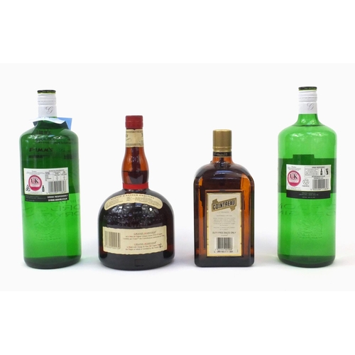 2227 - Four bottles of alcohol comprising two 1l bottles of Gordons Gin, 1l bottle of Cointreau and 1l bott... 