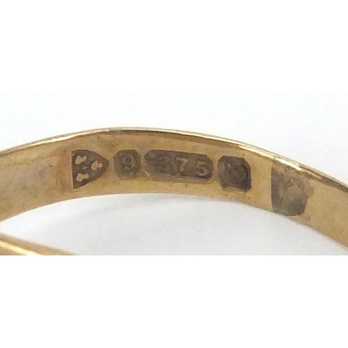 2605 - Six 18ct and 9ct gold rings, some set with stones and a 9ct gold wristwatch, approximate weight  23.... 