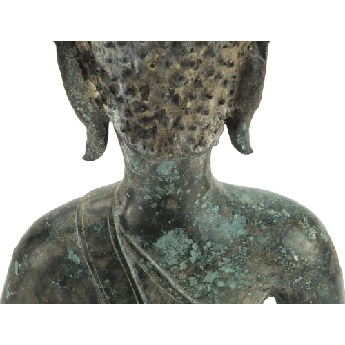 602 - Large antique Thai patinated bronze seated figure of Buddha, 43cm high