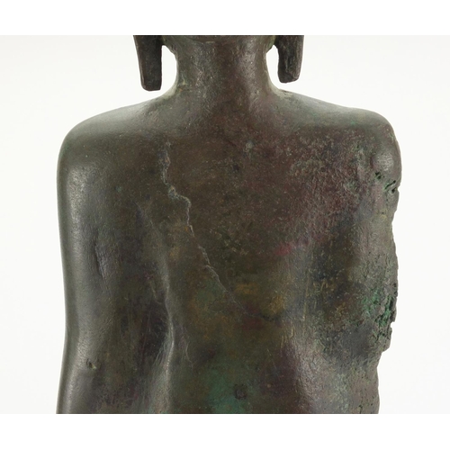 605 - Antique Thai patinated bronze standing figure of Buddha, on a later wooden stand, overall 61cm high