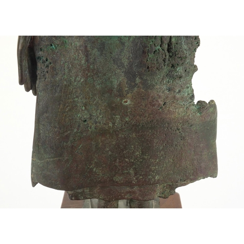 605 - Antique Thai patinated bronze standing figure of Buddha, on a later wooden stand, overall 61cm high