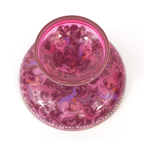 2257 - Pink glass pedestal glass dish, enamelled with floral swags, 7cm high