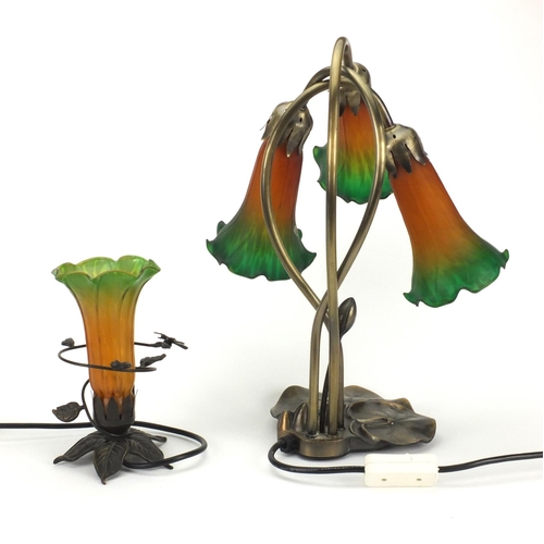 2219 - Art Nouveau style three branch desk lamp together with a desk lamp, all with orange and green frille... 