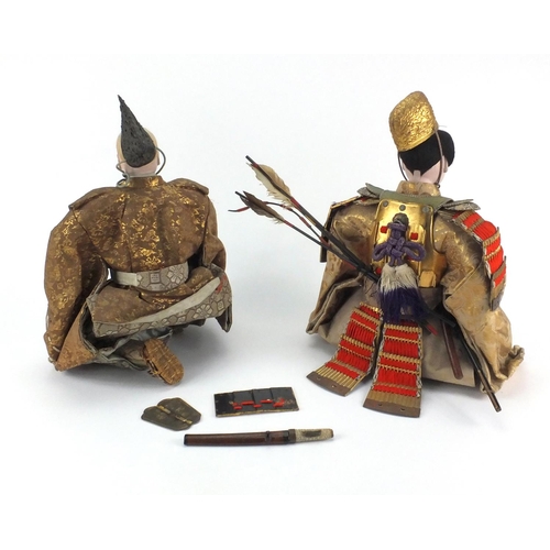 2275 - Two Oriental warrior figures in cloth dress, the largest 38cm high