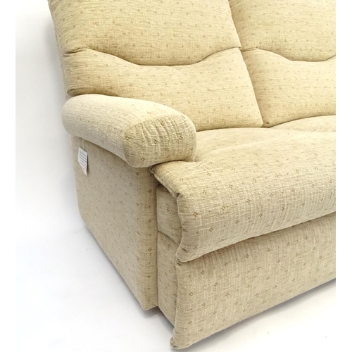 2023 - Beige upholstered two seater settee, 165cm long