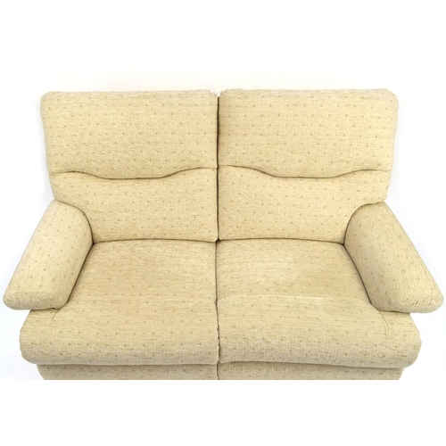 2024 - Beige upholstered two seater settee, 165cm long